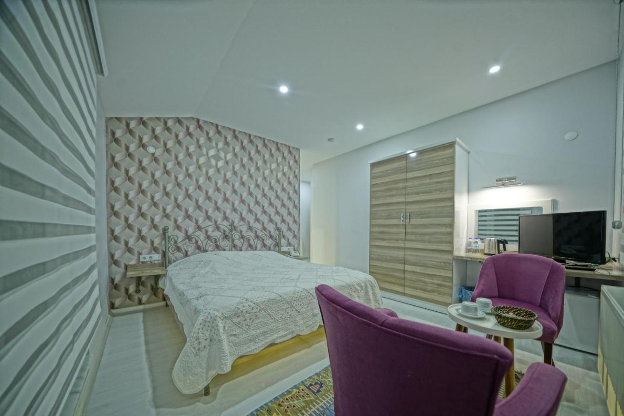 Cappadocia Symbol Hotel Üchisar Bagian luar foto